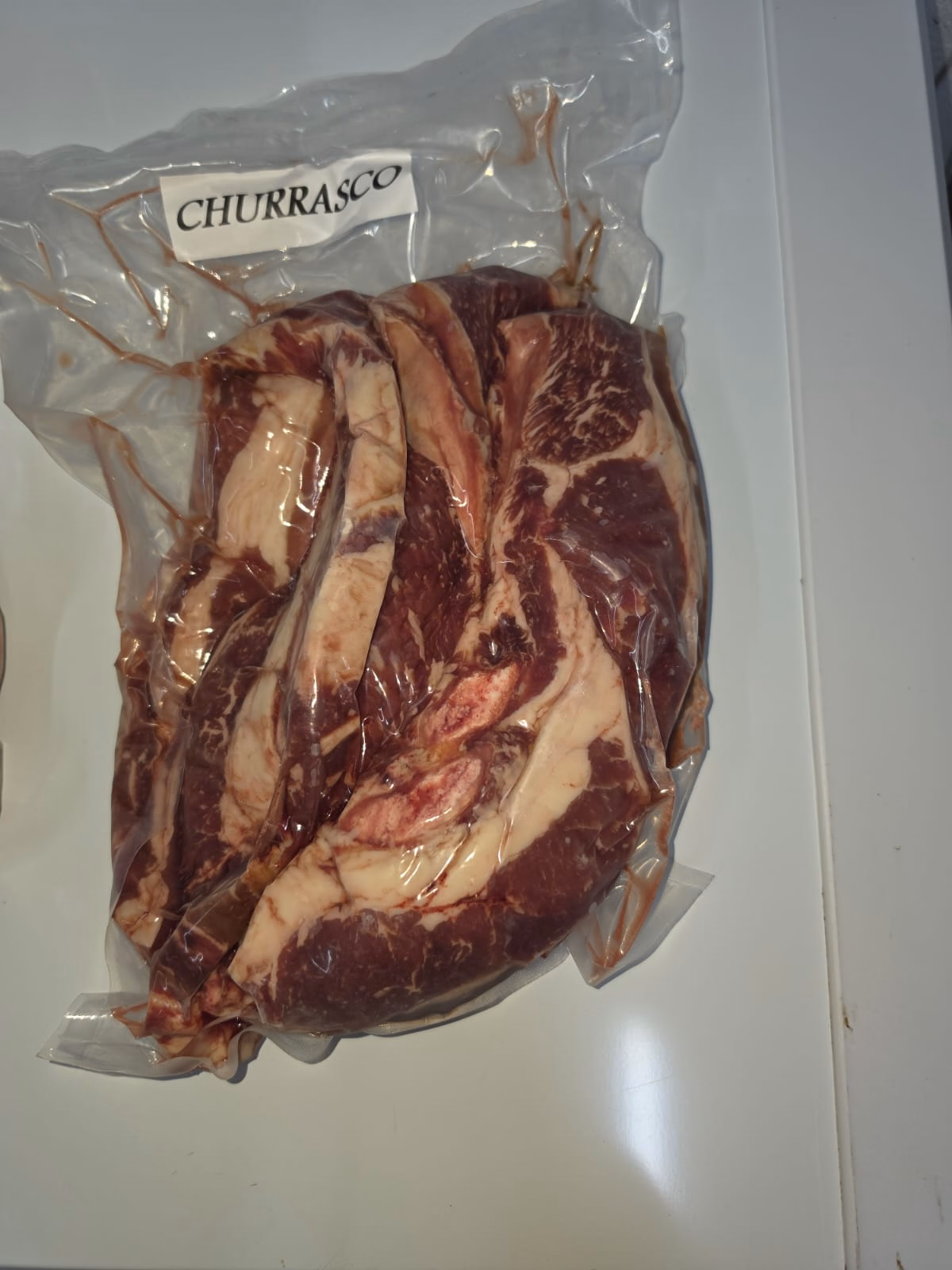 Churrasco de buey envasado al vacío, con el veteado a la vista
